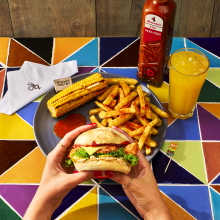 Nando's Cheesey Chickle Burger with PERi-Salted Chips, Corn on the Cob and Bottomless Fanta Zero Sugar